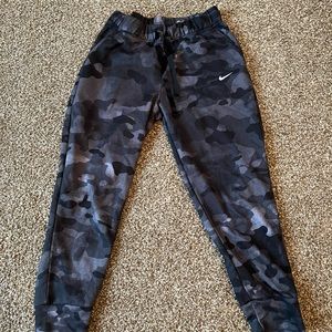 womens size small Nike joggers . Black camo